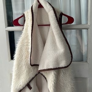 Adorable sleeveless vest from Simply Southern.